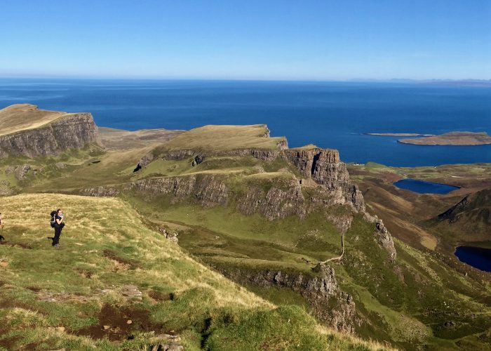 Top view of mountain cliffs with sea view